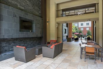 Cozy outdoor loggia with lounge seating